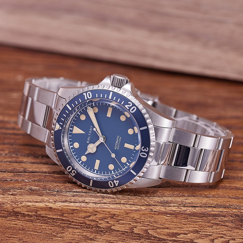 Baltany retro vintage diver with blue dial, blue bezel and cream vintage lume on a steel bracelet